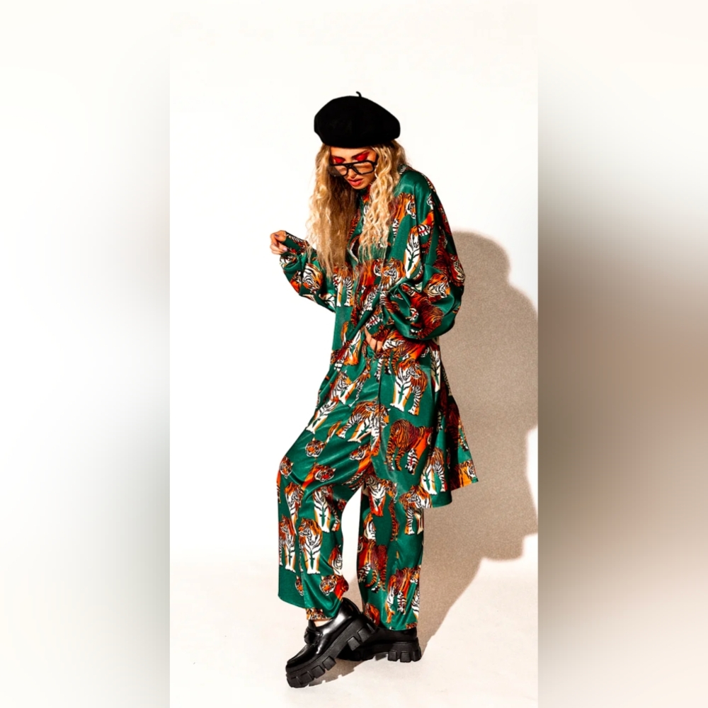 NWT (Still in bag & sold out online) dressed in lala stain playsuit (L/XL)